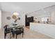 Open dining room with modern furnishings and access to the kitchen at 5417 Carlton Rd, New Port Richey, FL 34652
