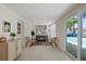 Relaxing living room adjacent to a pool area with natural light at 5417 Carlton Rd, New Port Richey, FL 34652