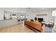 Open concept living space with modern furnishings, kitchen, dining area, and great natural light at 5417 Carlton Rd, New Port Richey, FL 34652