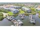 Stunning aerial view of condos, boat docks and boat slips; ideal for waterfront living at 5537 Sea Forest Dr # 301, New Port Richey, FL 34652