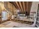 Unfinished attic with wood-beamed ceilings and plenty of room for storage at 5537 Sea Forest Dr # 301, New Port Richey, FL 34652