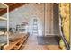Spacious unfinished attic with a ladder, concrete block walls, and wood beams at 5537 Sea Forest Dr # 301, New Port Richey, FL 34652