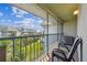 Balcony view with outdoor seating, and views of palm trees and neighborhood at 5537 Sea Forest Dr # 301, New Port Richey, FL 34652
