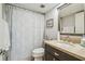 Well-appointed bathroom with a shower, vanity, and neutral decor at 5537 Sea Forest Dr # 301, New Port Richey, FL 34652