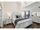 Primary bedroom features a vaulted ceiling, a window, and a light wood furniture set at 5537 Sea Forest Dr # 301, New Port Richey, FL 34652