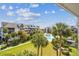 Community view showcasing the pool and landscaping, offering serene views at 5537 Sea Forest Dr # 301, New Port Richey, FL 34652