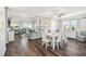 Spacious living and dining area filled with natural light, wood floors, and stylish decor at 5537 Sea Forest Dr # 301, New Port Richey, FL 34652