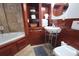 Bathroom featuring a sink and bathtub with jets at 6035 Sea Ranch Dr # 305, Hudson, FL 34667