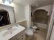 Bathroom featuring a pedestal sink, bidet, and shower/tub combo at 6035 Sea Ranch Dr # 305, Hudson, FL 34667
