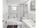 Cozy bathroom featuring a tub and shower combo with a patterned shower curtain and white vanity at 6422 Tralee Ave, New Port Richey, FL 34653