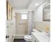 Simple bathroom design featuring a single sink, shower and toilet at 6422 Tralee Ave, New Port Richey, FL 34653