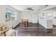 Bright dining area featuring hard floors, and large windows at 6422 Tralee Ave, New Port Richey, FL 34653