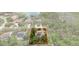 An aerial shot shows the home, featuring a screened pool and lush, mature landscaping at 6475 Laurel Oak Dr, Spring Hill, FL 34607