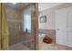 This bathroom features a glass enclosed shower and a separate soaking tub at 6475 Laurel Oak Dr, Spring Hill, FL 34607