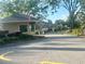 View of the guard house and entrance to the community at 6475 Laurel Oak Dr, Spring Hill, FL 34607