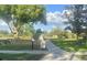This community space has lush green grass and lots of trees. Signage provides guidelines for residents at 6475 Laurel Oak Dr, Spring Hill, FL 34607