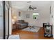 This cozy living room boasts hardwood floors and a ceiling fan for added comfort at 6475 Laurel Oak Dr, Spring Hill, FL 34607