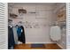 Walk-in closet with extensive shelving and hanging storage for optimal organization at 6475 Laurel Oak Dr, Spring Hill, FL 34607