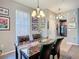 Inviting dining area with sophisticated decor and view of connecting rooms at 6821 Breezy Palm Dr, Riverview, FL 33578