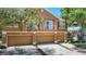 Townhome showcases a three-car garage with a well-maintained lawn and inviting curb appeal at 6821 Breezy Palm Dr, Riverview, FL 33578