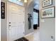 Bright front entry featuring tile floors and views into connecting rooms at 6821 Breezy Palm Dr, Riverview, FL 33578