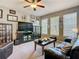 Comfortable living room space featuring neutral walls, a ceiling fan, and natural light at 6821 Breezy Palm Dr, Riverview, FL 33578