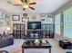 Comfortable living area featuring neutral walls, a ceiling fan, and natural light from the windows at 6821 Breezy Palm Dr, Riverview, FL 33578