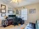 Home office featuring neutral walls, a leather chair, and dual computer monitors at 6821 Breezy Palm Dr, Riverview, FL 33578
