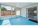 Screened patio offering a covered outdoor space with access to the backyard at 7034 N King Arthur E Dr # 4, Port Richey, FL 34668