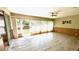 Tiled sun room featuring sliding glass doors leading to the outside at 7495 Heather Walk Dr, Weeki Wachee, FL 34613