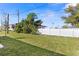 Large backyard space featuring a privacy fence and grass lawn at 8312 40Th N St, Pinellas Park, FL 33781