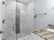 Bathroom with glass door walk-in shower and granite counter at 8312 40Th N St, Pinellas Park, FL 33781