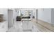 Open kitchen features white cabinets, stone counters and stainless steel appliances at 8312 40Th N St, Pinellas Park, FL 33781