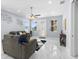 Spacious living room with tile floors, recessed lighting, and modern furnishings at 8312 40Th N St, Pinellas Park, FL 33781