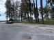 A gravel parking area near a park and boat launch provides convenient access to recreational amenities at 00 Purdue St, New Port Richey, FL 34654