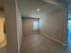 Versatile bonus room with neutral walls, recessed lighting, tile flooring, and a bright window at 10012 Zennia Ln, Parrish, FL 34219