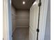 Walk-in closet with shelving and neutral paint at 10012 Zennia Ln, Parrish, FL 34219