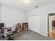 Bright bedroom with closet and neutral carpeted floors at 11050 Kiskadee Cir, New Port Richey, FL 34654