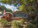 Cross Creek at Summertree brick community sign surrounded by lush green landscaping at 11050 Kiskadee Cir, New Port Richey, FL 34654