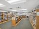 A well-stocked library with rows of books, seating, and a quiet atmosphere at 11050 Kiskadee Cir, New Port Richey, FL 34654