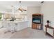 Kitchen boasts white countertops, a breakfast bar with seating, and ample cabinet space at 11524 Holly Ann Dr, New Port Richey, FL 34654