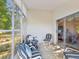 Comfortable patio overlooking beautiful greenery, perfect for relaxation and outdoor enjoyment at 11524 Holly Ann Dr, New Port Richey, FL 34654