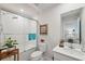 Bathroom with shower-tub combo and white vanity at 12214 Grizzly Ln, New Port Richey, FL 34654