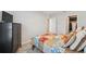 Bedroom with black cabinet and walk-in closet at 12214 Grizzly Ln, New Port Richey, FL 34654