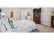 Bright bedroom with a comfortable bed, stylish furniture, and plenty of natural light at 12214 Grizzly Ln, New Port Richey, FL 34654