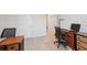 Bright home office with neutral walls and plush carpet, perfect for remote work at 12214 Grizzly Ln, New Port Richey, FL 34654