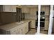 Bright kitchen featuring ample countertop space and stainless steel appliances at 12371 Dearborn Dr, Hudson, FL 34667