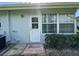 Backyard featuring a door and large window at 12541 Dearborn Dr # B, Hudson, FL 34667