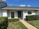 Charming home featuring a tidy front entrance with neat landscaping and a well-maintained exterior at 12541 Dearborn Dr # B, Hudson, FL 34667