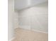 Spacious walk-in closet featuring wire shelving and neutral paint at 13366 Barkingside Pl, Spring Hill, FL 34609